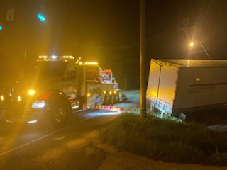 portable building relocation at night